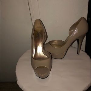 Nude peep toe pumps